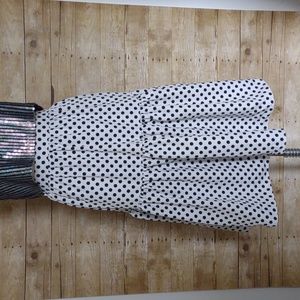 Black and white polka dot tea-length ruffle skirt